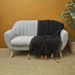 THE HOME DECO FACTORY Jeté De Canapé Surpiqué Pompons Noir 130x150 Cm - Noir 7 THE HOME DECO FACTORY Jeté De Canapé Surpiqué Pompons Noir 130x150 Cm - Noir -Plaid et couverture Soldes 53628287 3